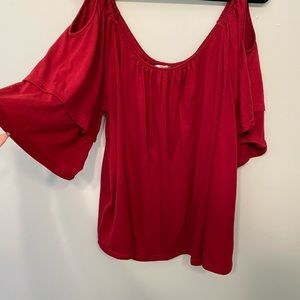 Off the shoulder red shirt